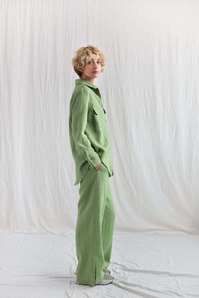 Woman wearing white linen pants and oversized tee – perfect spring outfit.