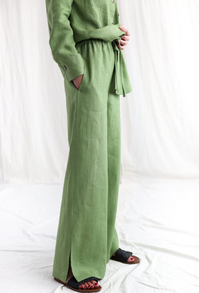 Woman wearing white linen pants and oversized tee – perfect spring outfit.