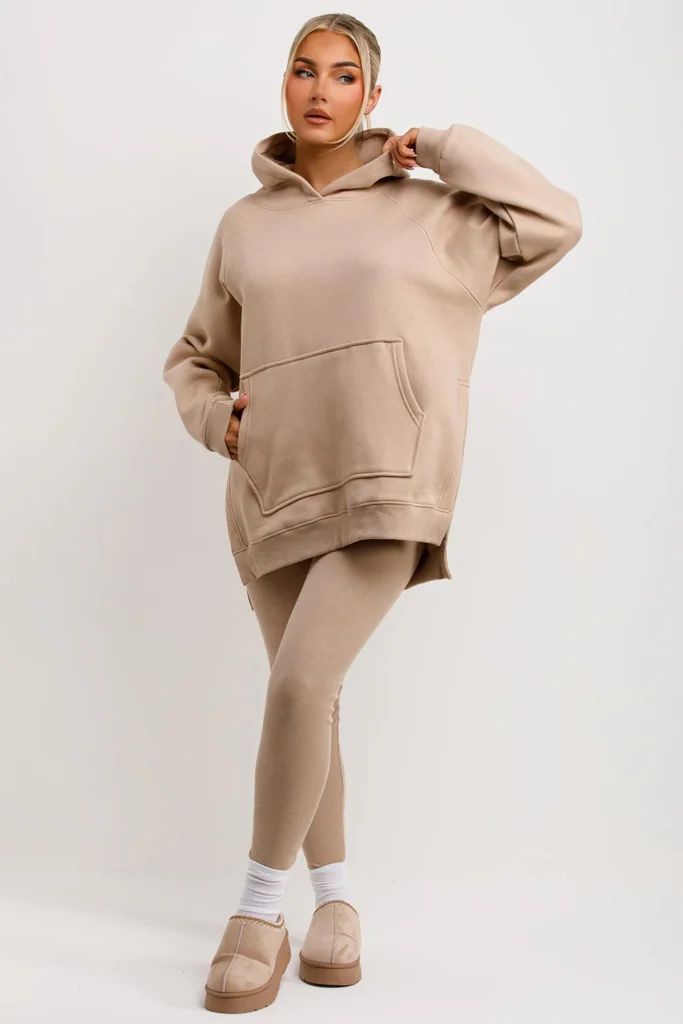 Trendy teen showcasing elevated athleisure with an oversized hoodie and fashion-forward accessories.